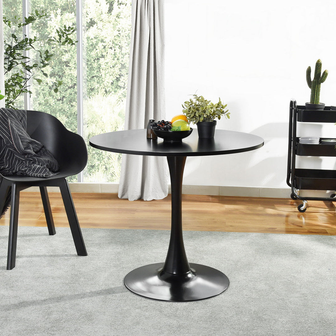 Table à manger ronde sur piédestal peinte inspirée du milieu du siècle pour petits espaces