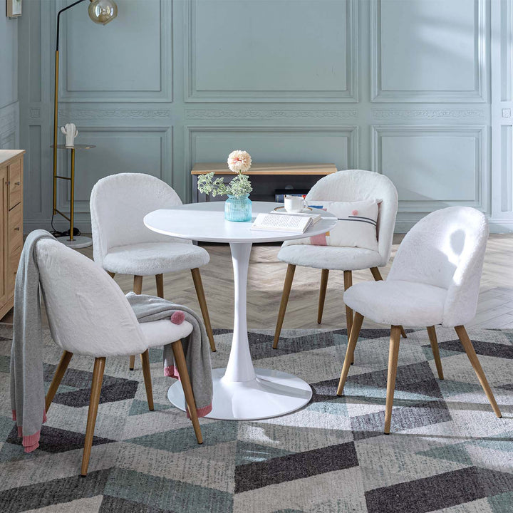 Table à manger ronde sur piédestal peinte inspirée du milieu du siècle pour petits espaces