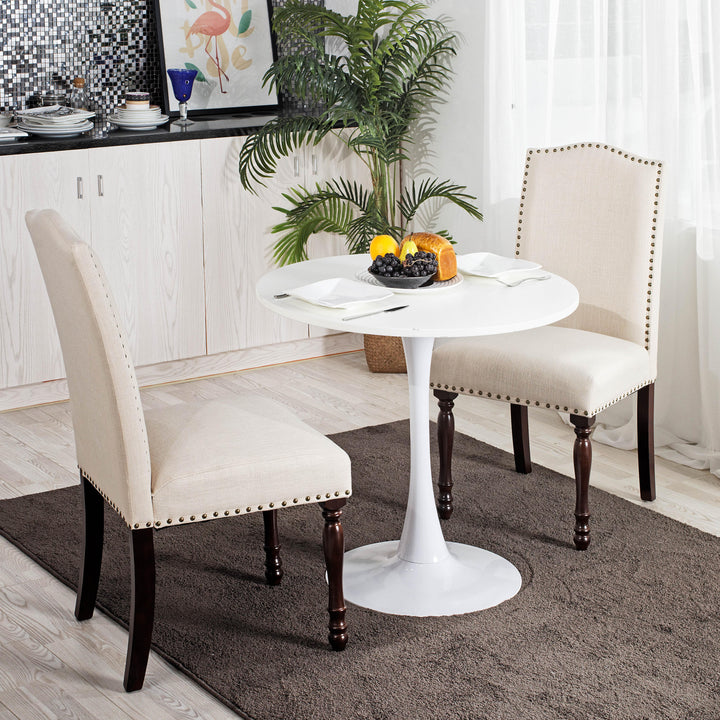 Table à manger ronde sur piédestal peinte inspirée du milieu du siècle pour petits espaces